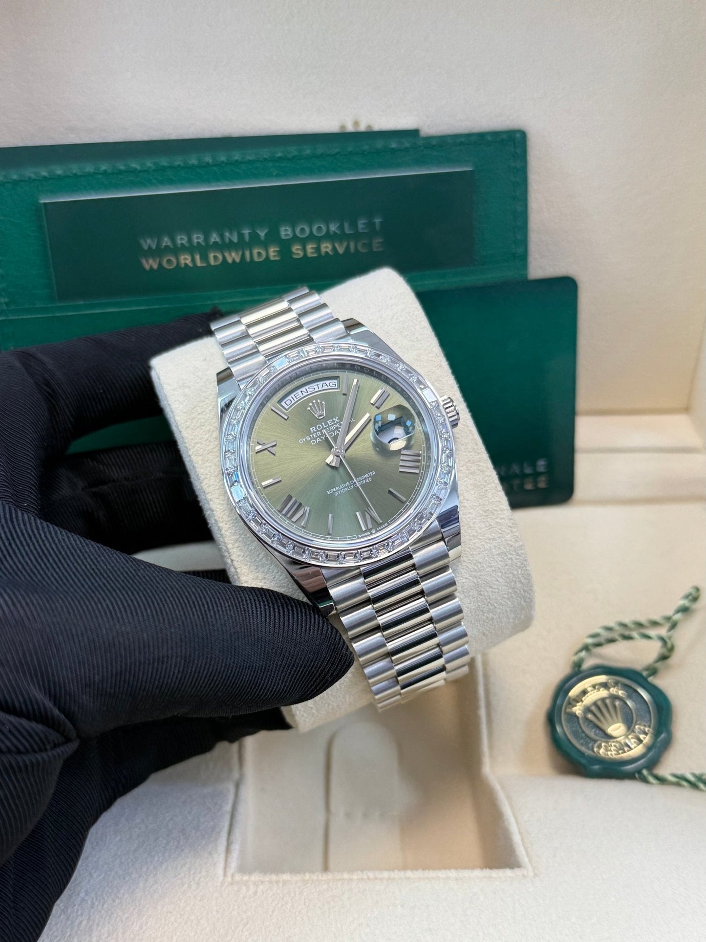 Rolex Day-Date 40 Baguette Diamond Bezel Olive Green Roman Dial President Bracelet 228396TBR German Day Wheel