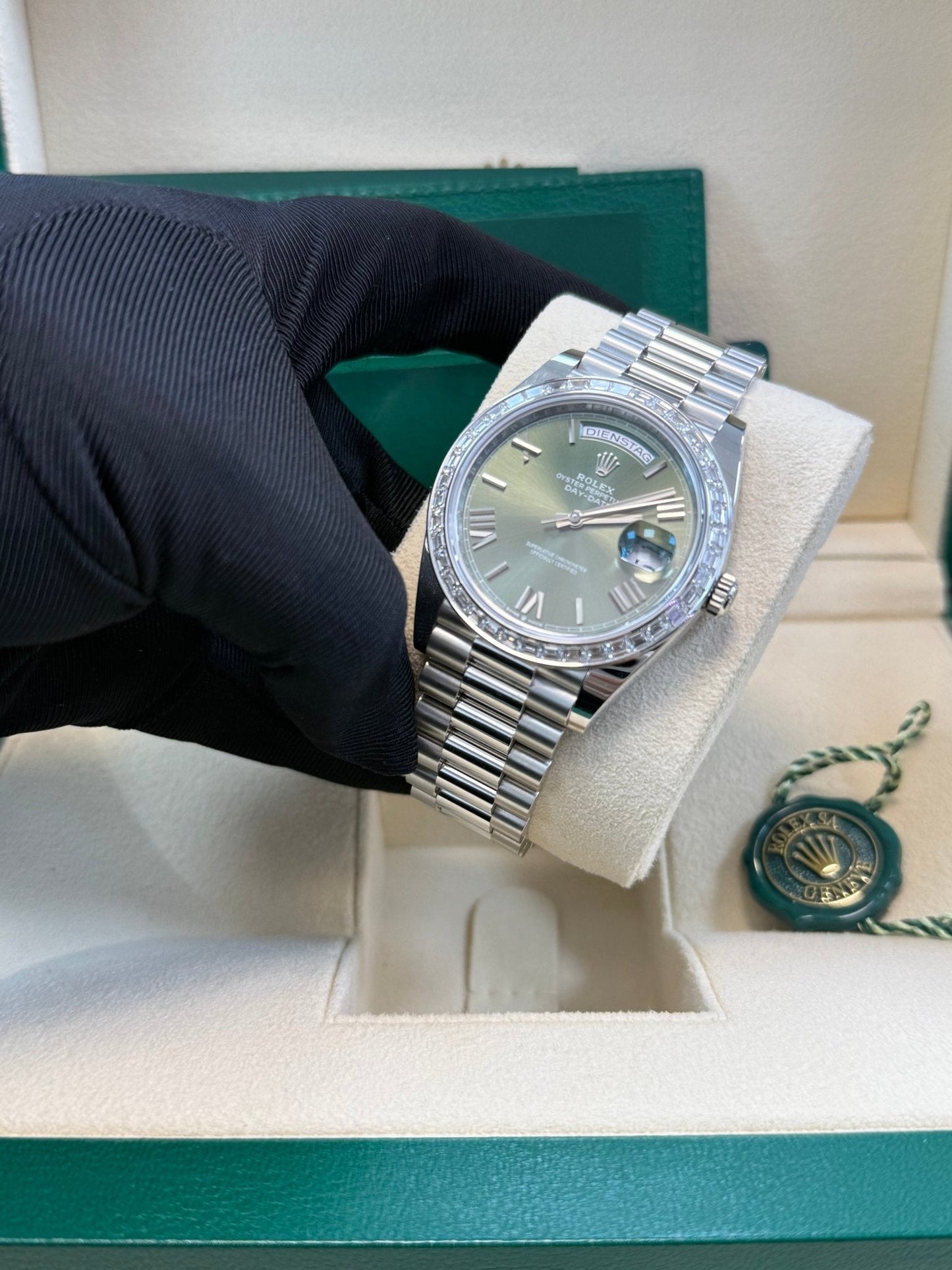 Rolex Day-Date 40 Baguette Diamond Bezel Olive Green Roman Dial President Bracelet 228396TBR German Day Wheel