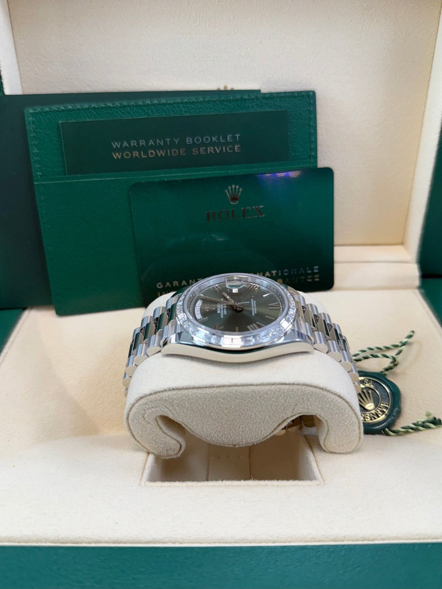 Rolex Day-Date 40 Baguette Diamond Bezel Olive Green Roman Dial President Bracelet 228396TBR German Day Wheel