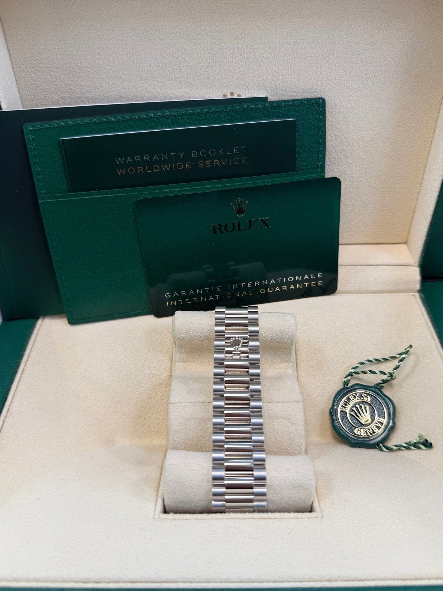 Rolex Day-Date 40 Baguette Diamond Bezel Olive Green Roman Dial President Bracelet 228396TBR German Day Wheel