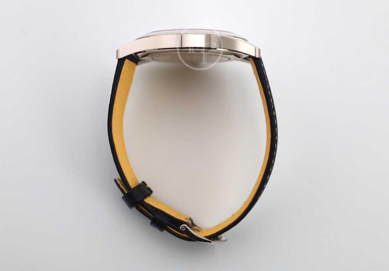 Patek Philippe Calatrava Date Sweep Seconds White Gold Black Carbon Motif Yellow Dial | 6007G-001