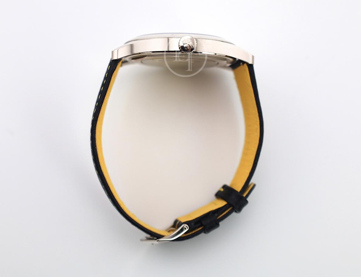 Patek Philippe Calatrava Date Sweep Seconds White Gold Black Carbon Motif Yellow Dial | 6007G-001