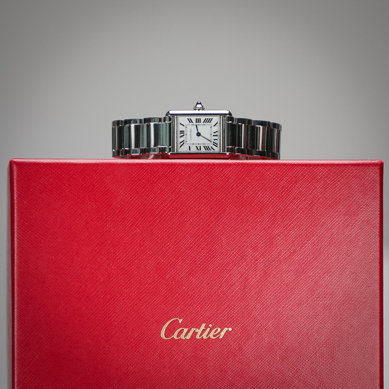 Cartier Tank Must 29.5 mm x 22.0 mm Silver Dial Steel Bracelet WSTA0107