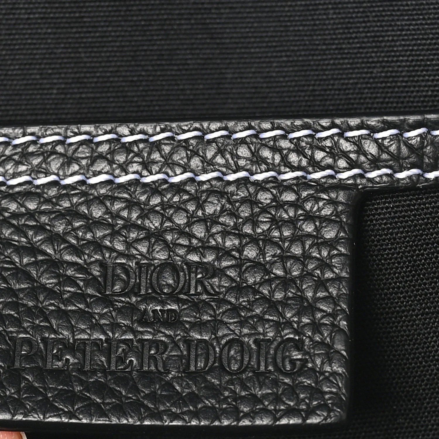 X PETER DOIG Grained Calfskin Slingbag Backpack Black