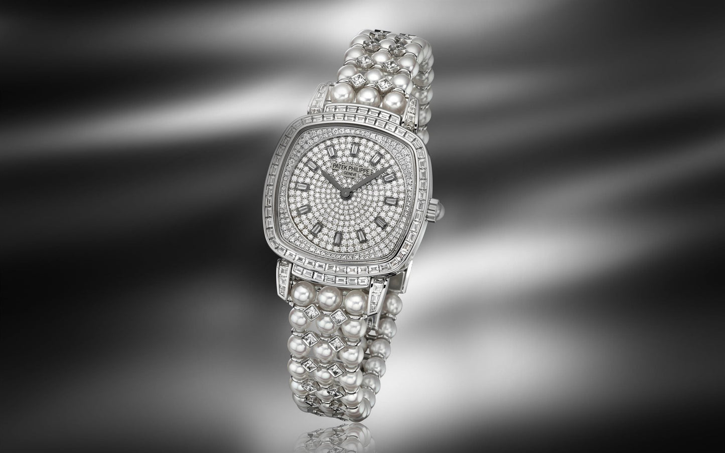 Patek Philippe Ladies Gondolo Haute Joaillerie, 18kt White Gold set with diamonds and Akoya pearls, 31 × 34.8mm, Ref# 7042/100G-010