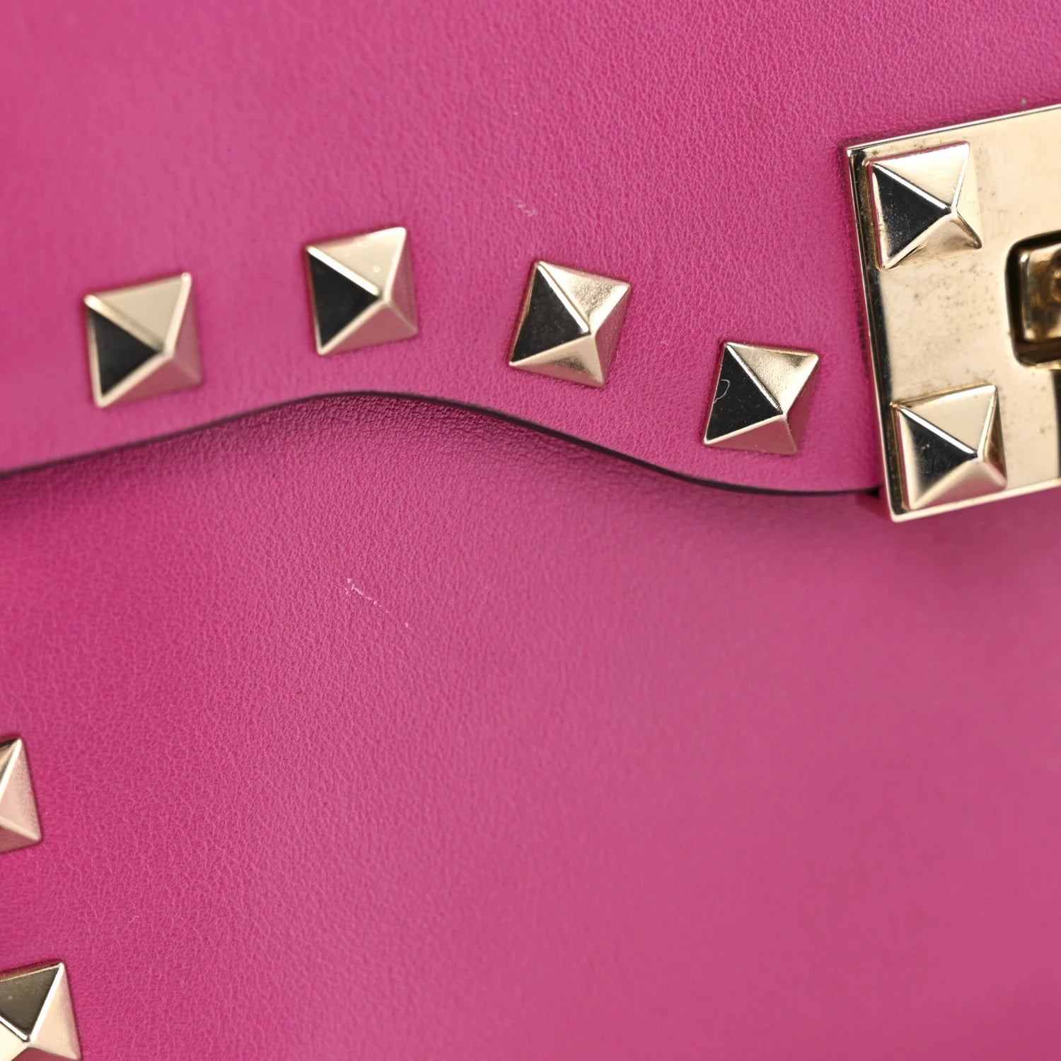 Vitello Small Rockstud Flip Lock Crossbody Bag Fuxia