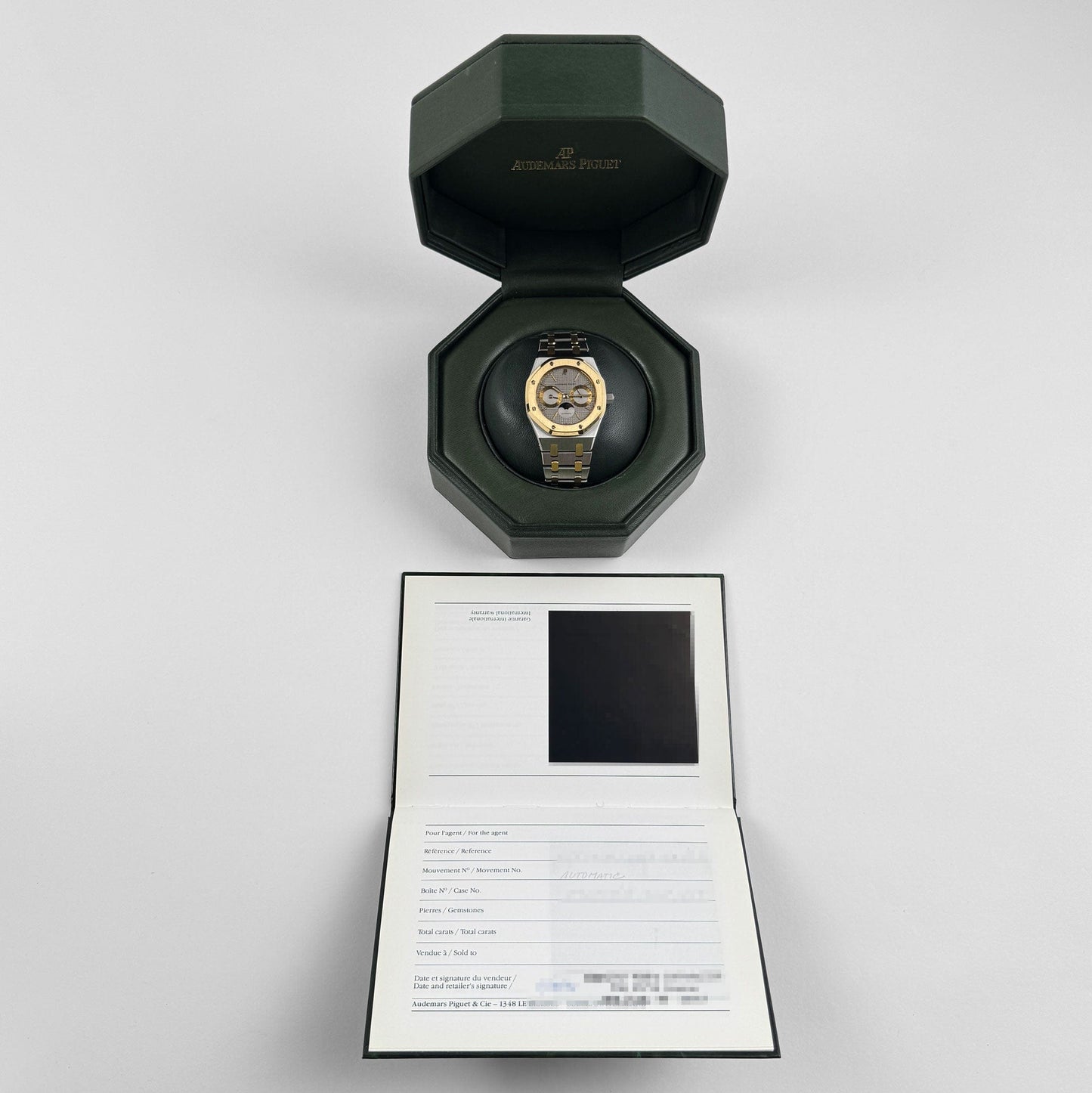 Audemars Piguet Royal Oak 25594SA.OO.0789SA.01 Day-Date Moonphase Yellow Gold Stainless Steel Silver Dial (1994)