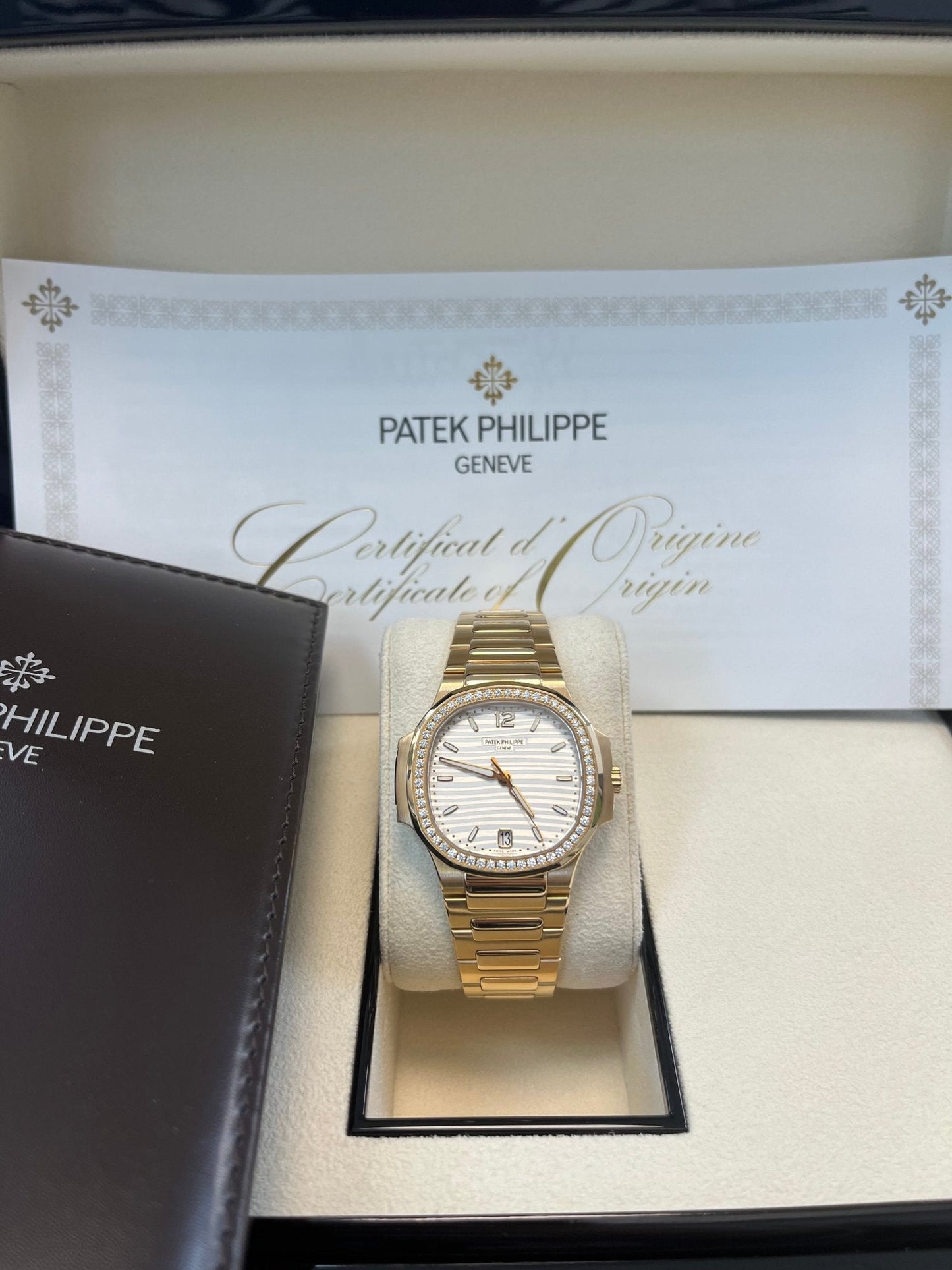 Patek Philippe Nautilus Ladies Rose Gold Nautilus White Dial Diamond Bezel 7118/1200R-001