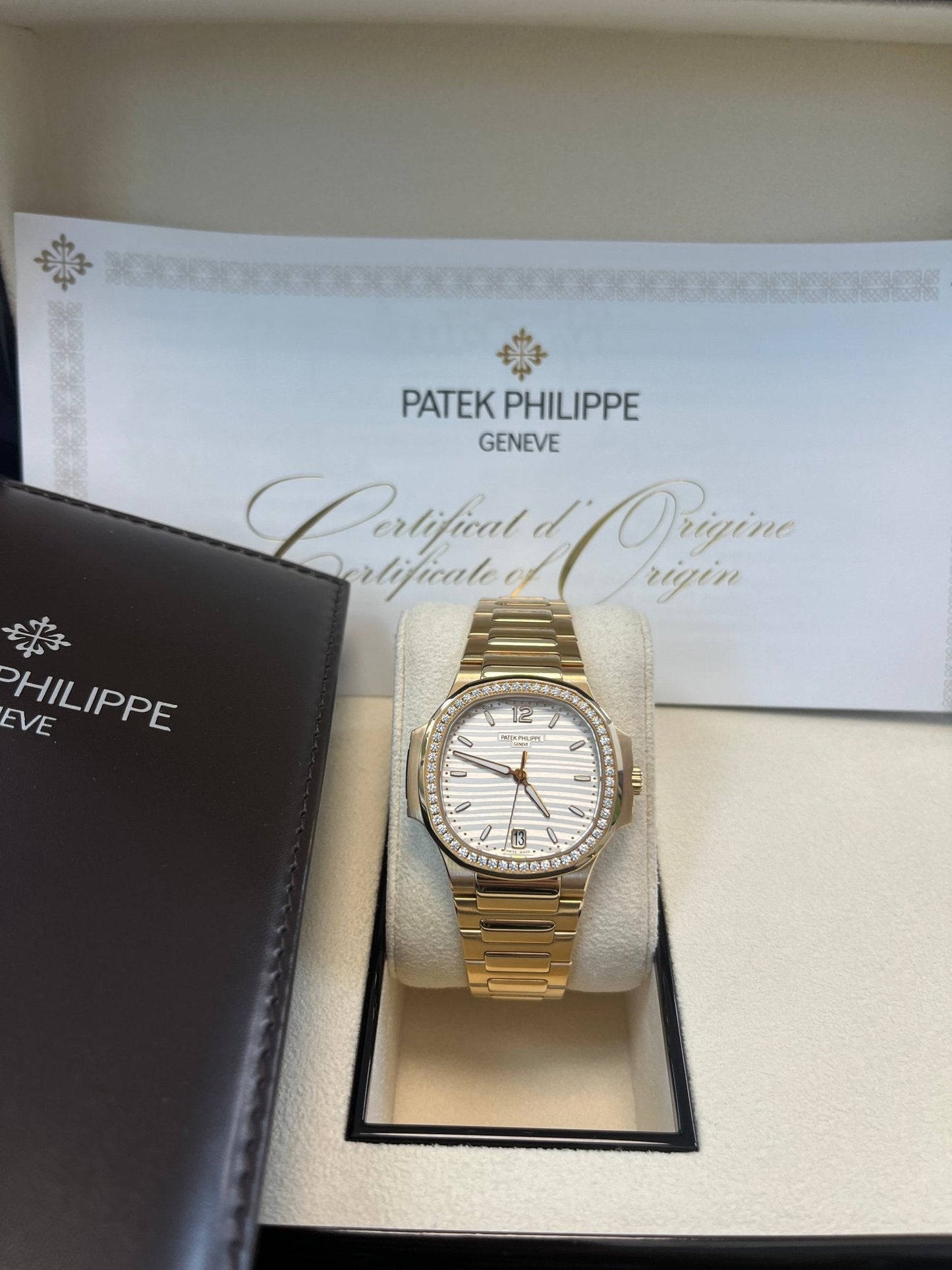 Patek Philippe Nautilus Ladies Rose Gold Nautilus White Dial Diamond Bezel 7118/1200R-001
