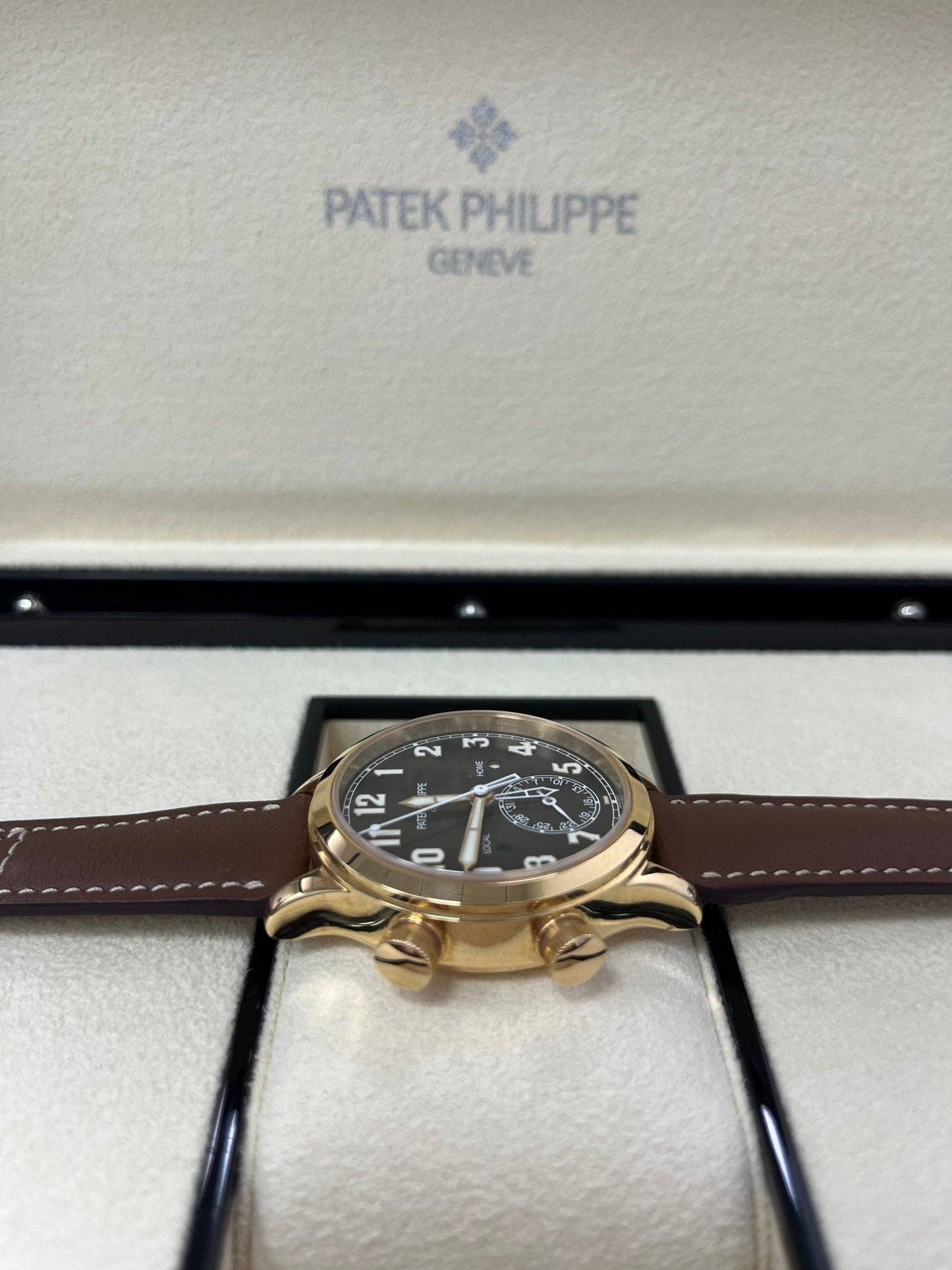 Patek Philippe Travel Time 37mm Rose Gold/ Brown Sunburst Dial (Ref# 7234R-001)