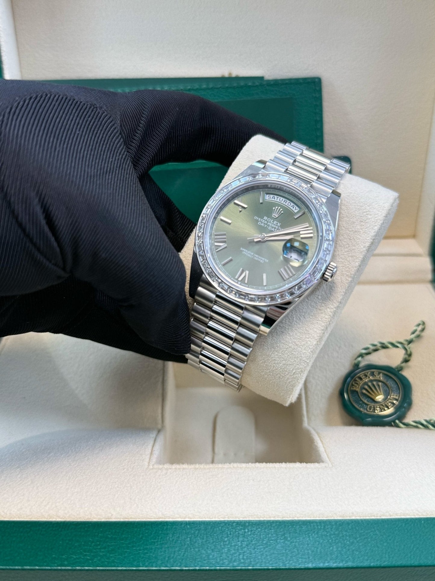 Rolex Day-Date 40 Baguette Diamond Bezel Olive Green Roman Dial President Bracelet 228396TBR